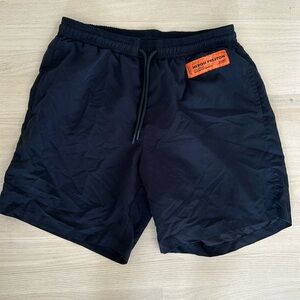 Heron Preston black shorts